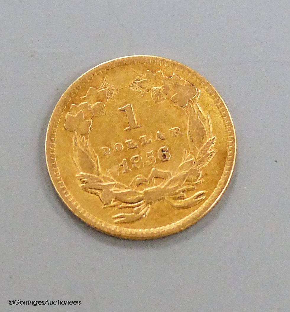 An American 1856 one dollar gold coin